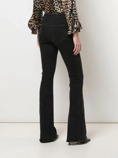 Shop Mother High-rise Flared Jeans In Black