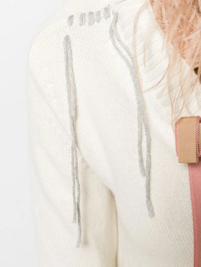 FEATHERED TASSEL JUMPER