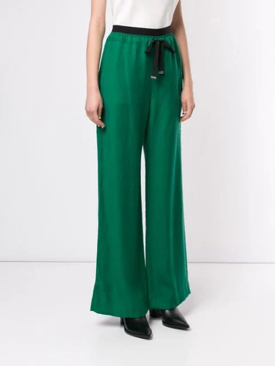 Shop Taylor Fluency Flared Trousers In Green