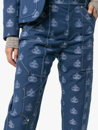 Shop Chloé Printed Emblem Trousers In Blue