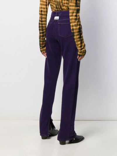 Shop Ganni Mid Rise Ankle Slit Jeans In Purple
