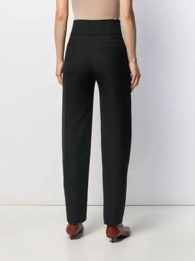 Shop Totême Ossi High-rise Tailored Trousers In Black