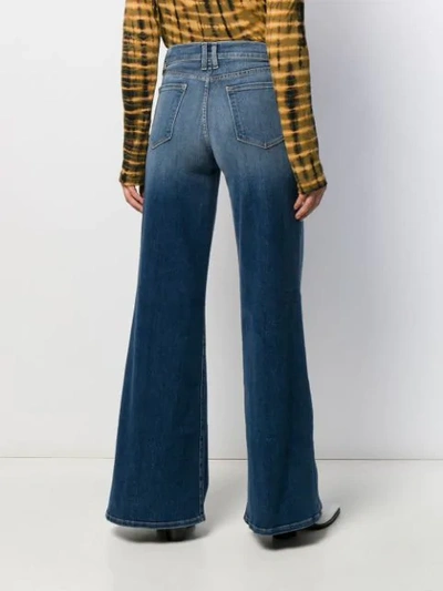 Shop Frame High-waisted Wide Jeans In Blue