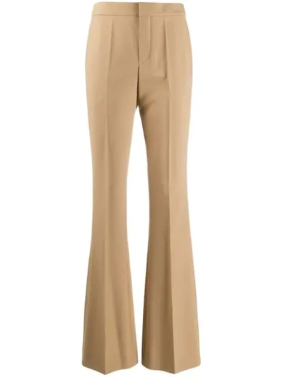 Shop Chloé High-rise Flared Trousers In Brown