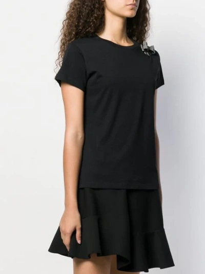 Shop Pinko Bow-embellished T-shirt - Black
