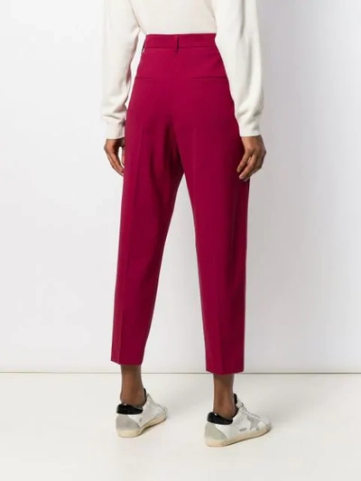 Shop Brunello Cucinelli Tapered Ankle Trousers In Red