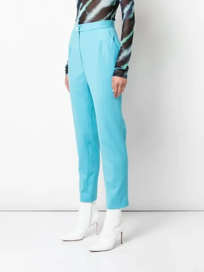 Shop Natasha Zinko Cropped Tapered Trousers In Blue