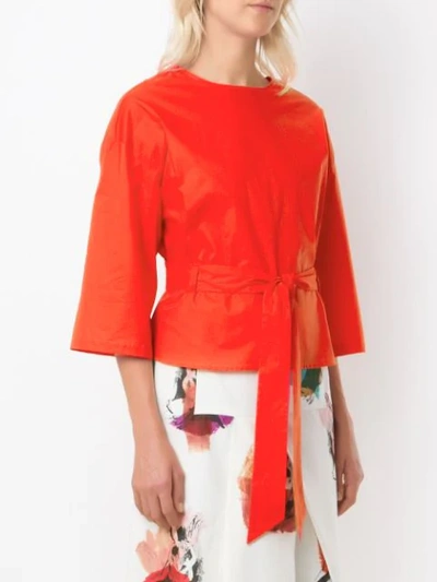 Shop Andrea Marques Belted Wrap Blouse In Orange