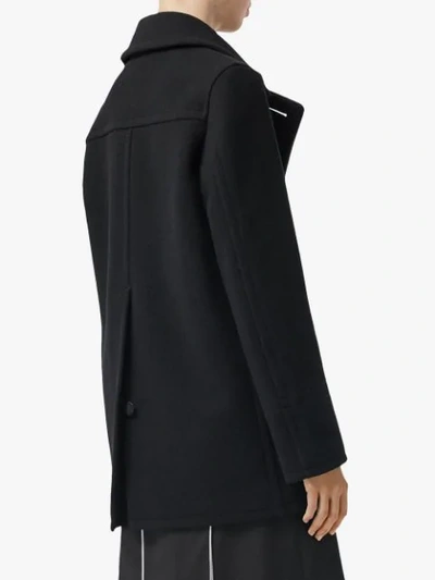 Shop Burberry Leather Pockets Peacoat In Black