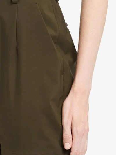 Shop Prada Zip Details Layered Trousers In Green