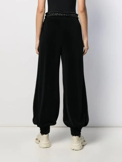 Shop Gucci Tapered Wide-leg Trousers In Black