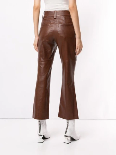 Shop Brunello Cucinelli Cropped Leather Flared Trousers In Brown