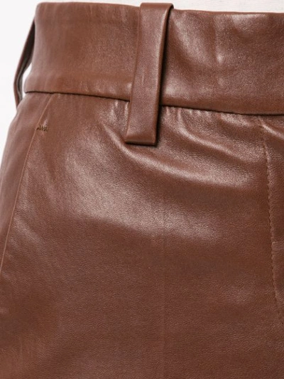 Shop Brunello Cucinelli Cropped Leather Flared Trousers In Brown