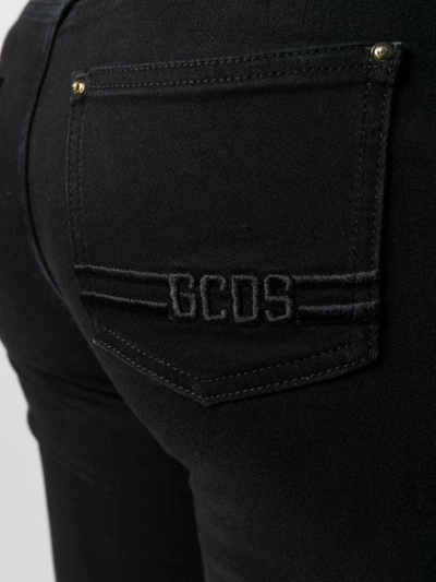Shop Gcds High-waisted Skinny Jeans In Black