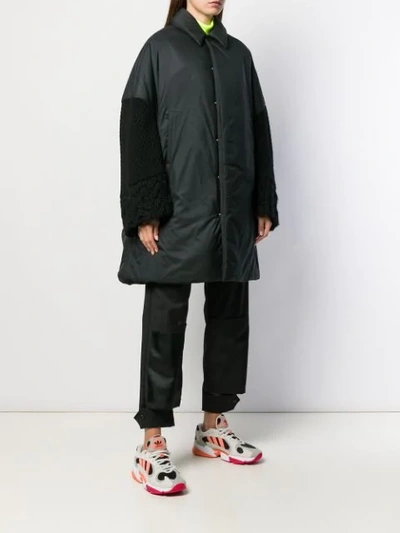 Shop Undercover Dual-fabric Oversized Coat In Black