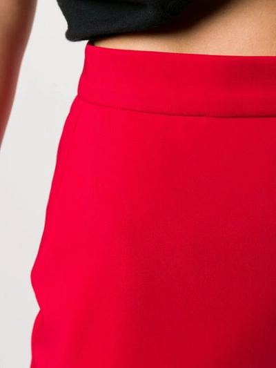 Shop Loulou High Rise Mini Skirt In Red
