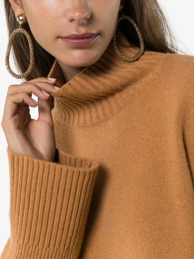 Shop Frame High Low Turtleneck Jumper In Brown