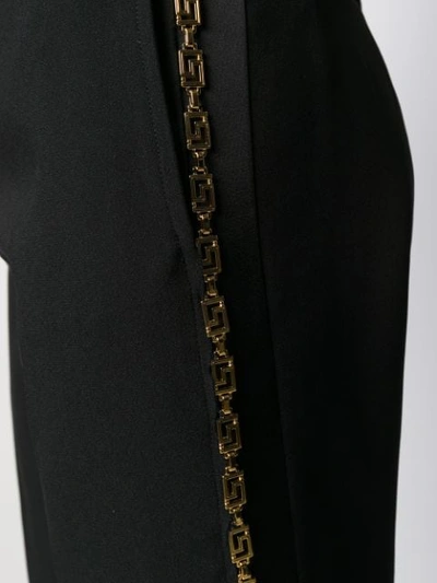 Shop Versace Greca-chain Tailored Trousers In Black