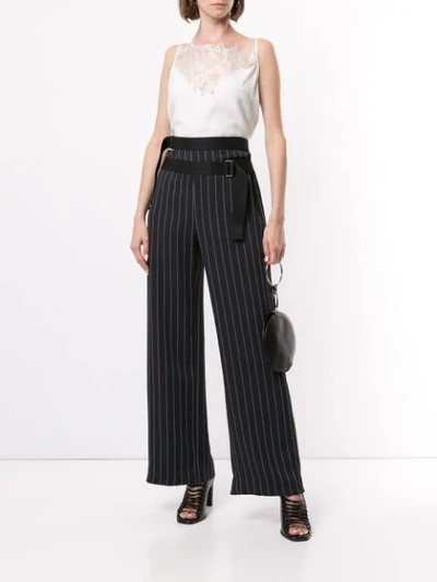 Shop Dion Lee Pinstriped Wide-leg Trousers In Black