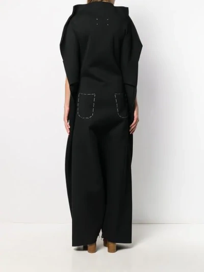 Shop Maison Margiela Exposed Stitch Jumpsuit In Black