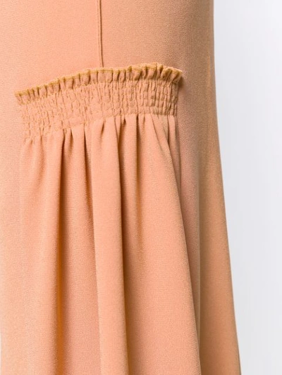 Shop Chloé Flared Trousers - Neutrals