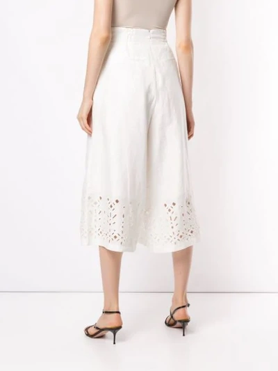 Shop Aje Clara Broderie Cropped Trousers In White