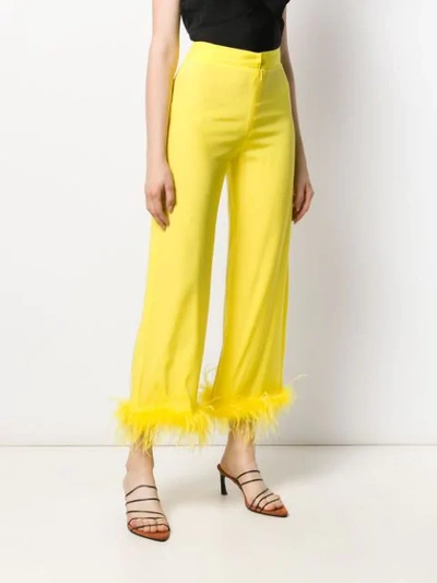 Shop Silvia Astore Feather-embellished Cropped Trousers In Yellow