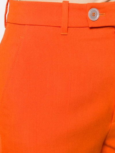 Shop Gucci High-rise Tapered Trousers In Orange