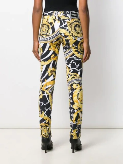 Shop Versace Barocco Print Skinny Jeans In Black