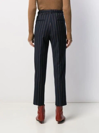 Shop Incotex Striped Tapered Trousers In Blue
