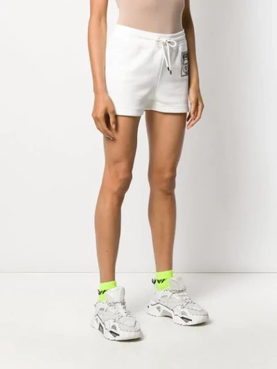 Shop Moschino Teddy Label Running Shorts In 4002 White