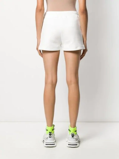 Shop Moschino Teddy Label Running Shorts In 4002 White