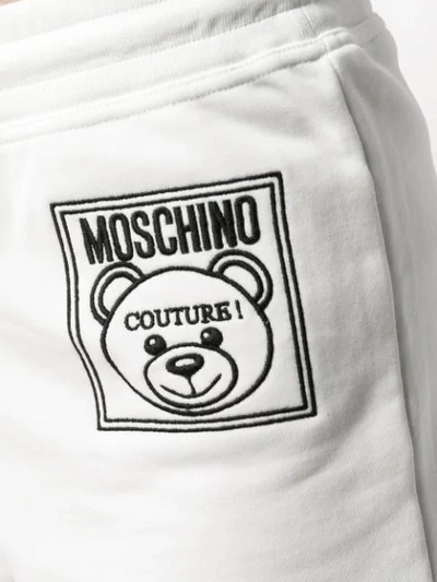Shop Moschino Teddy Label Running Shorts In 4002 White
