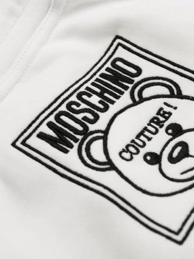 Shop Moschino Teddy Label Running Shorts In 4002 White