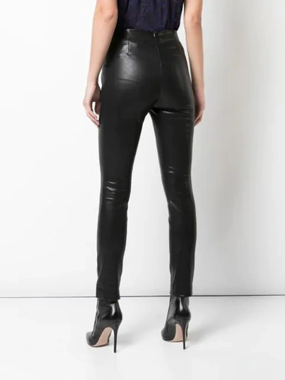HIGH RISE SKINNY FIT TROUSERS
