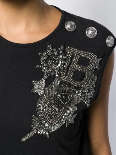 Shop Balmain Embellished Logo Top In Black/silver/eac