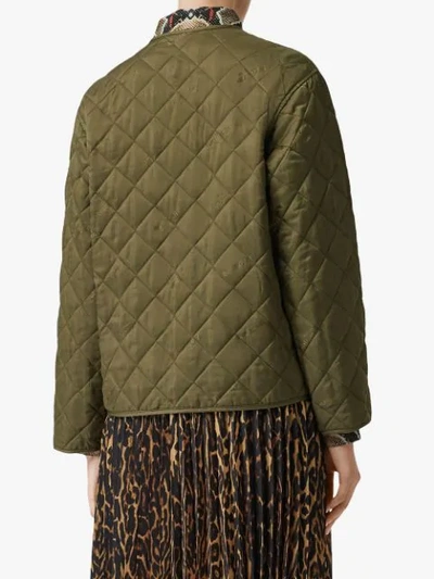 Shop Burberry Logo Print Quilted Jacket In Green