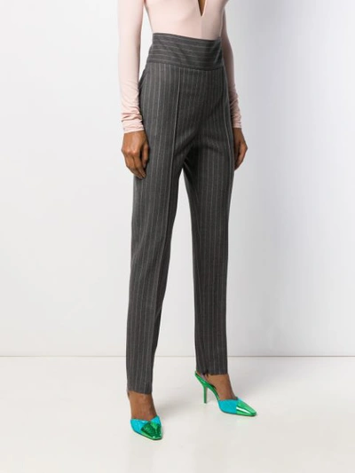 Shop Alexandre Vauthier Pinstripe High-waisted Trousers - Grey