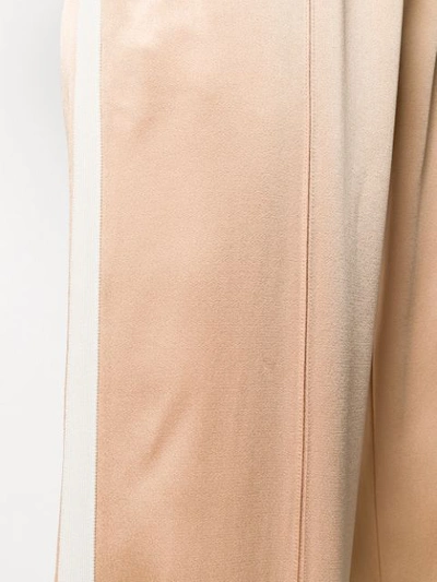 Shop Moncler Flared Track Pants In Neutrals