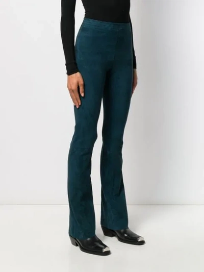 Shop Drome Flared Style Trousers In Blue
