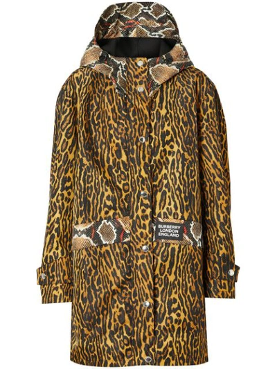 Shop Burberry Animal Print Hooded Coat In Yellow