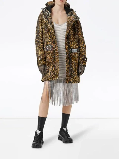 Shop Burberry Animal Print Hooded Coat In Yellow