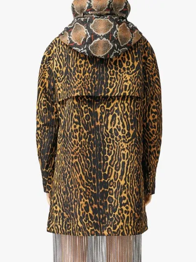 Shop Burberry Animal Print Hooded Coat In Yellow