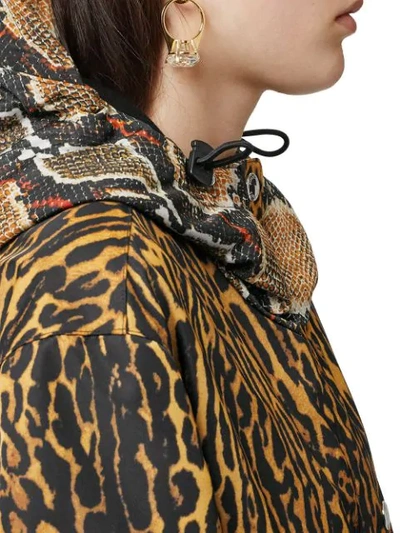 Shop Burberry Animal Print Hooded Coat In Yellow