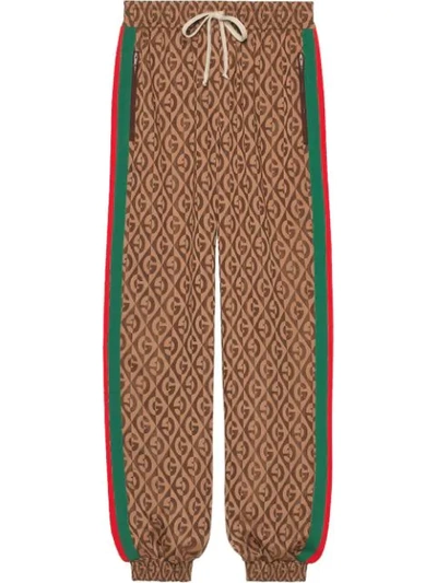 Shop Gucci Monogram Print Track Pants In Brown