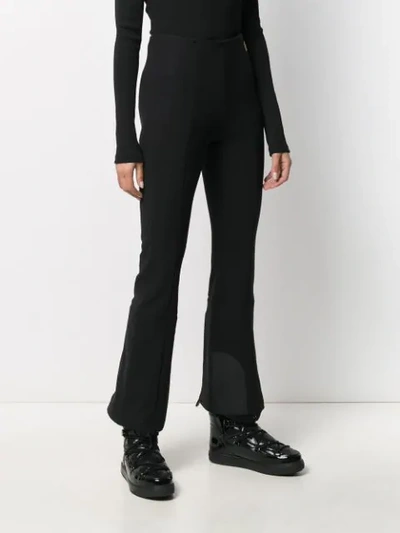 Shop Moncler Double-cuff Flared Trousers In Black