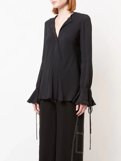 Shop Derek Lam 10 Crosby Bell Sleeve Pebbled Crepe Blouse - Black