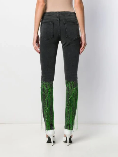 EMBROIDERED FRINGED SKINNY JEANS