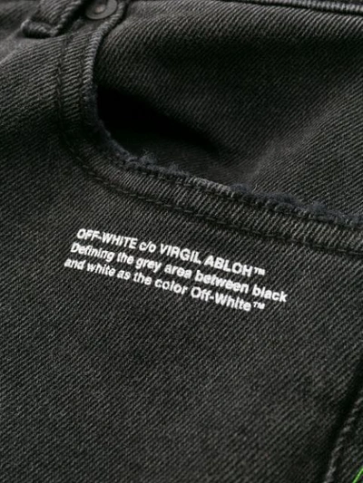 EMBROIDERED FRINGED SKINNY JEANS