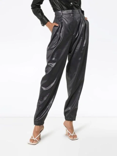 Shop Tibi Liquid Pleated Trousers - Schwarz In Black